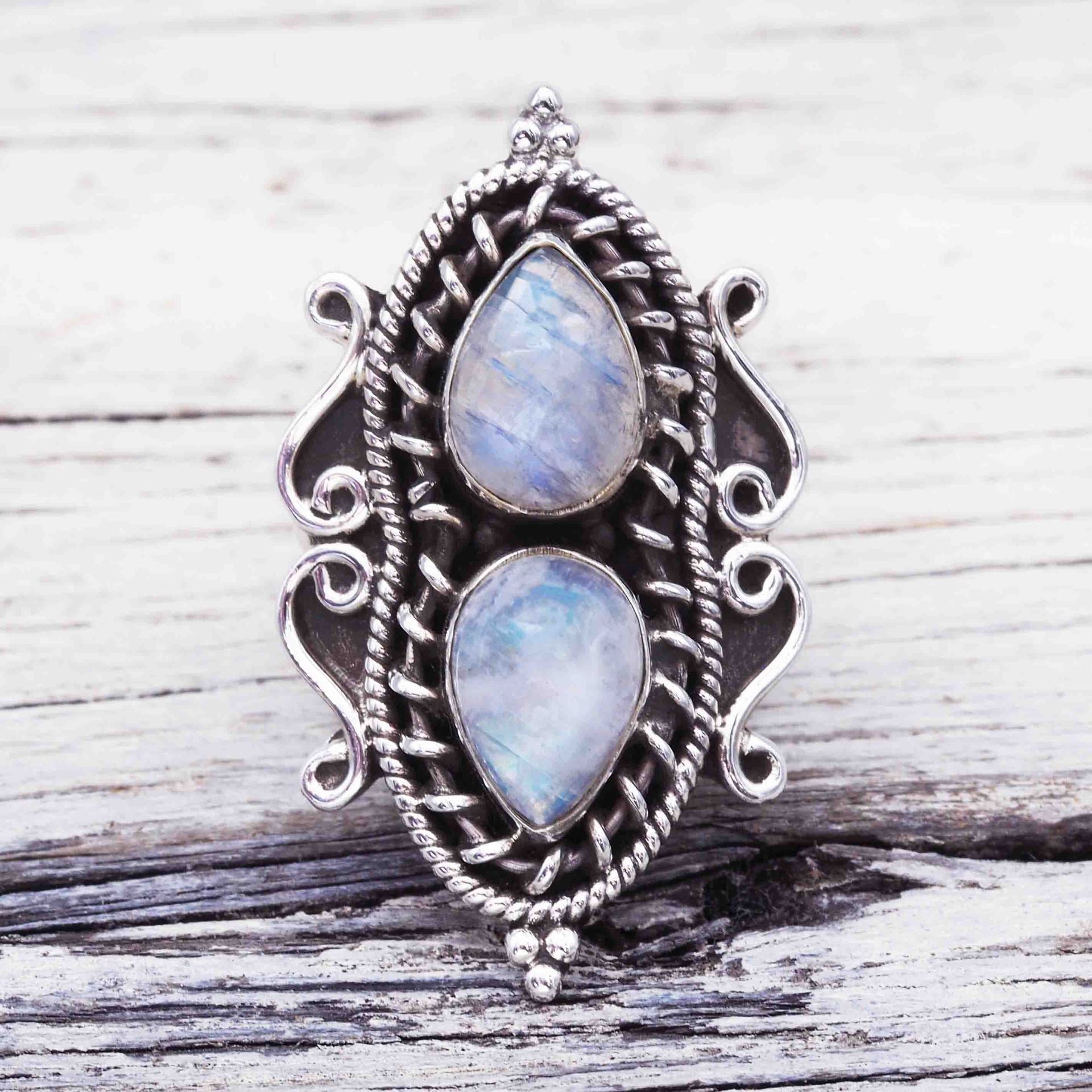 Pear-shaped moonstone ring with water drops